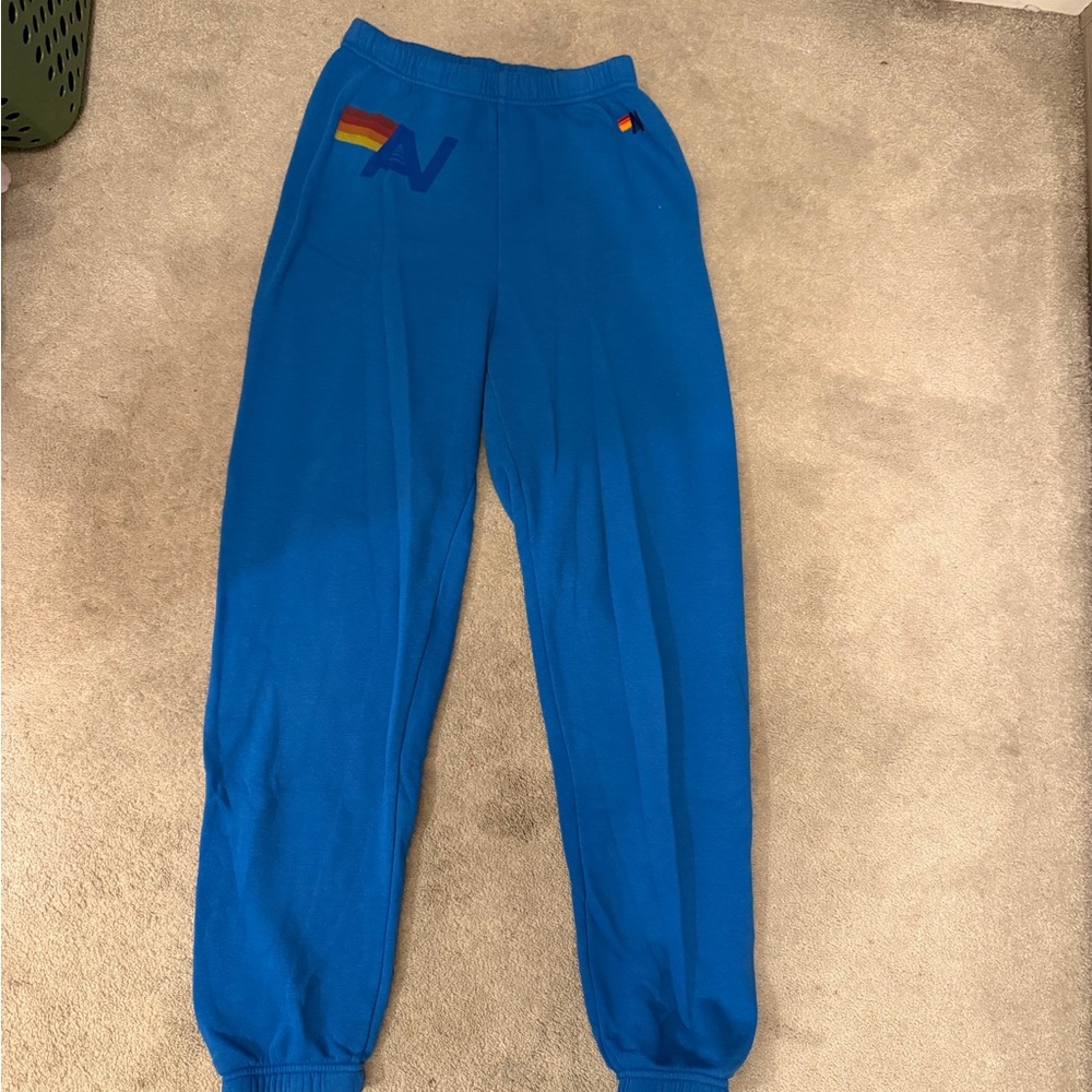 Aviator Nation Blue Track Pants with Rainbow Detail